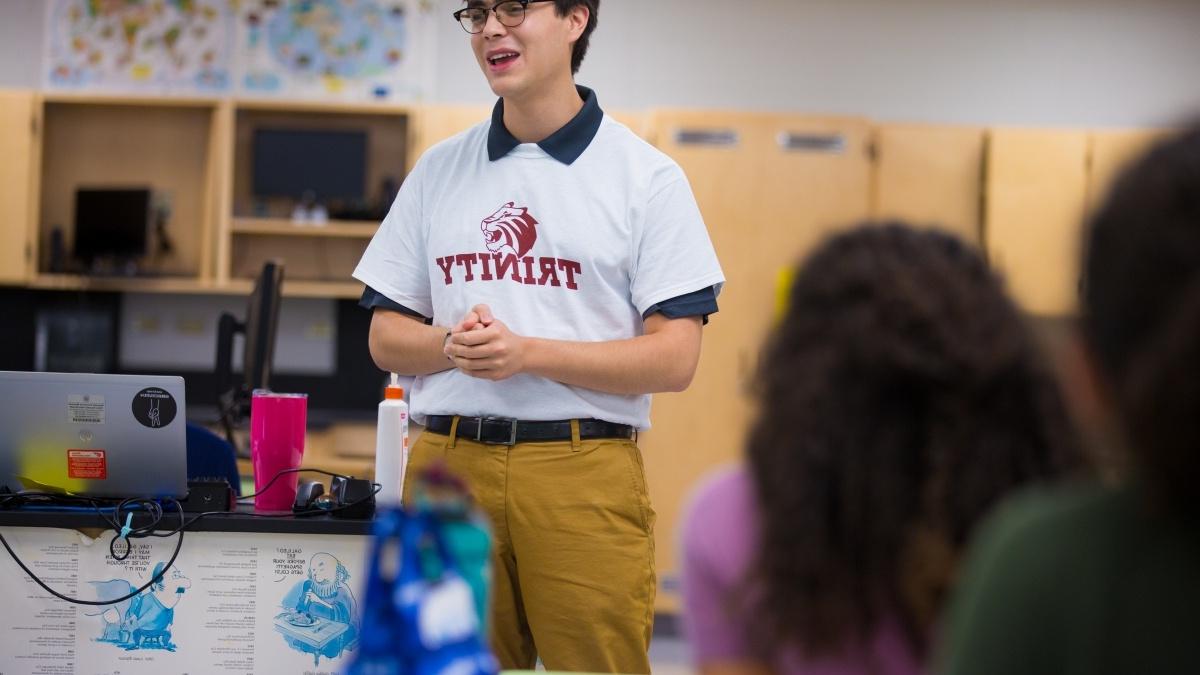 Trinity student speaking to high school class